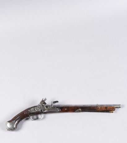 null Pistolet à pierre en noyer gravé lazarino

doninalli.

Le chien à décor d’une...