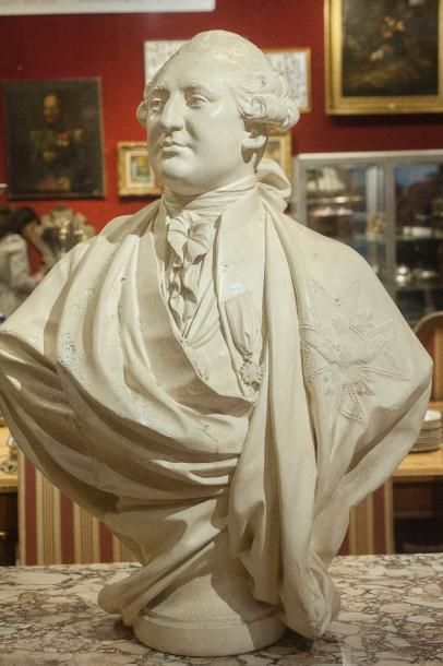 null Buste du Roi Louis XVI

Plâtre, reproduction des musées.

Haut 100 cm. Usur...