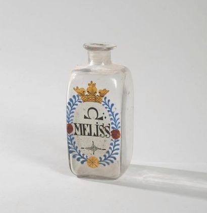 null Flacon à eau de mélisse en verre soufflé, décor peint émaillé. 

XVIIIe siècle....