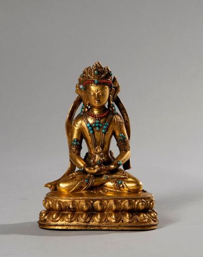 null Chine

XVe siècle ou postérieure

Statue de Bouddha d‘Amitayus en bronze doré

H...
