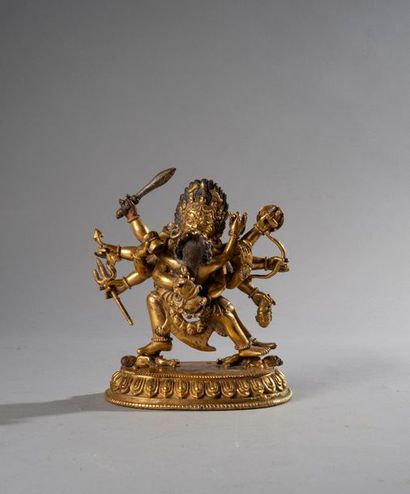 null Chine

XVIIIe siècle

Statuette de Mahakala à six bras debout en bronze doré...