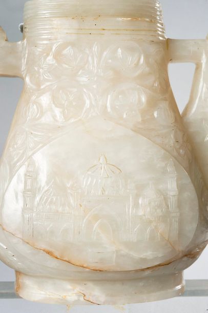 null Chine Dynastie Ming

Rare thérière en jade blanc sculpté de Mosquée

H 16 c...