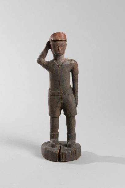 null Statuette africaine en bois représentant un colon.
