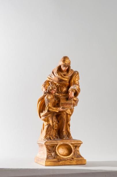 null GROUPE EN BOIS sculpté, doré et polychrome représentant sainte Anne apprenant...