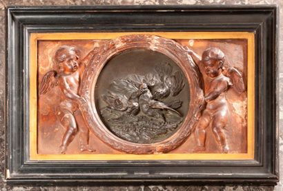 null Médaillon en bronze à patine brune représentant trois oiseaux en bas relief...
