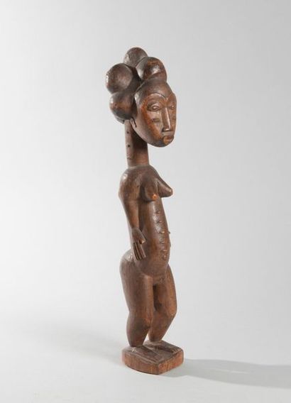 Statuette Baoulé en bois représentant une...