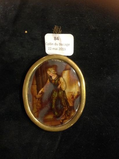  Ecole FRANCAISE de la fin du XIXe siècle 
Femme au bénitier 
Miniature ovale. 
...