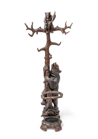 null Carved wooden coat rack decorated with a

of a bear and her cub in a tree

as...