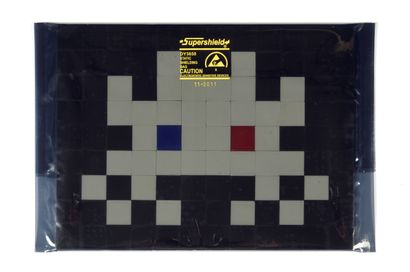 INVADER (Français, né en 1969) Mosaic tiles in unopened original blister 
Signed,...