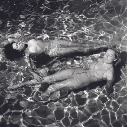 AFP AFP

Bain de piscine à Marrakech, en avril 1946.

Photographie sur papier baryté...