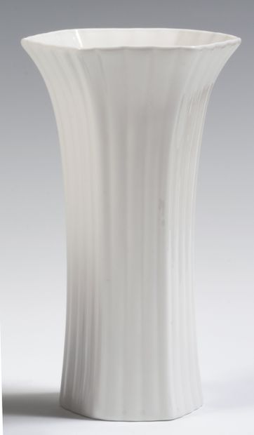 null 
England

Pair of white porcelain hexagonal vases with raised fluting.

20th...