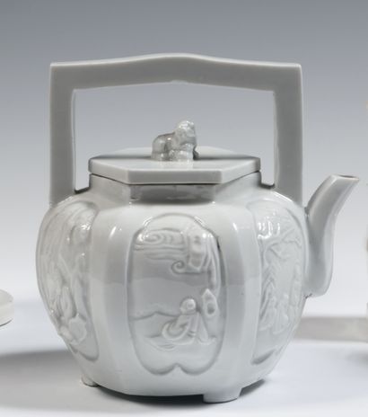 null 
China

Large covered teapot in white porcelain of hexagonal form with relief...