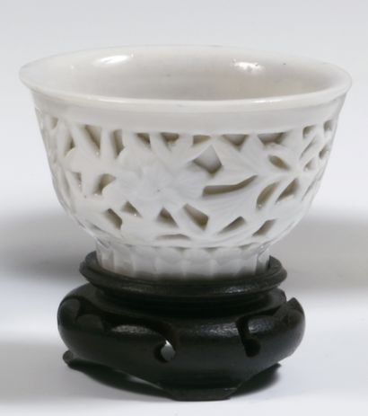 null 
China

A pair of Chinese-white double-walled porcelain bowls, the outer wall...