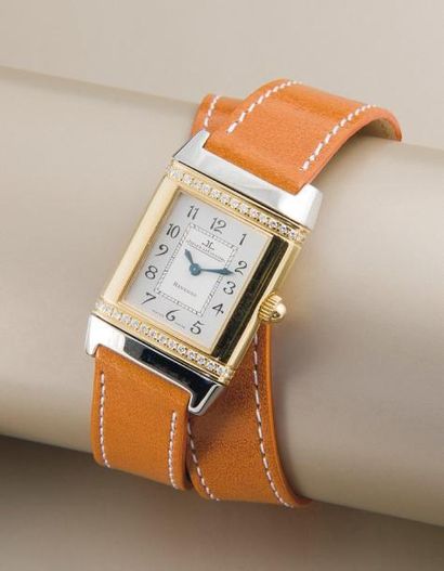 JAEGER-LeCOULTRE (REVERSO FLORALE / OR & ACIER), VERS 2002 Montre de dame rectangulaire...