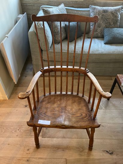 Wooden armchair with bars