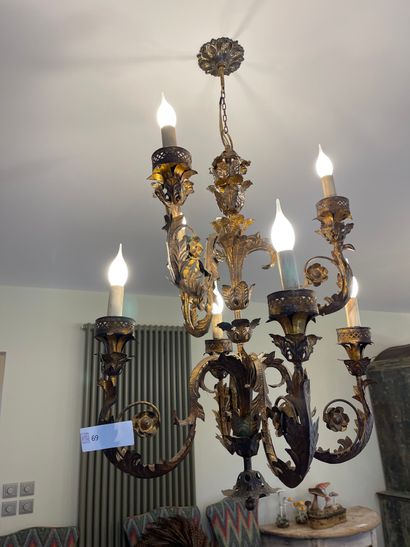 null Three chandeliers, two of which form a pair, in patina metal with foliage decoration,...