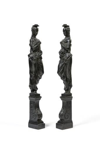 Paire de statuettes d’appliques Paire de statuettes d’appliques en bronze à patine...