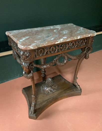 null Carved oak console with an openwork belt with foliage, it rests on three cambered...