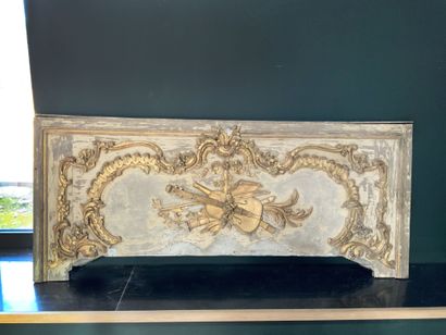 null Carved and gilded wood overmantel with music attributes 

XVIIIth century Some...