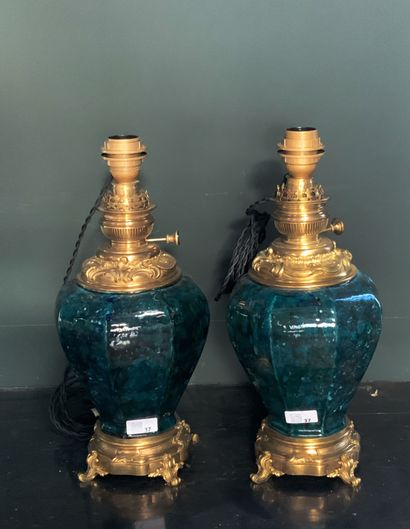 Pair of blue-green glazed ceramic and gilded...