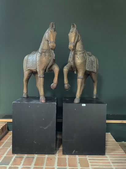  Pair of horses in wood with hammered metal...