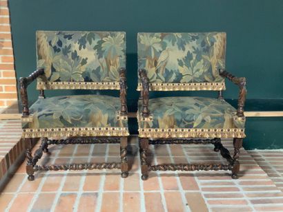 null 
Pair of armchairs in carved walnut, base, armrest in turned wood and support...