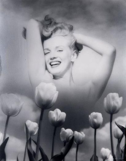 André de DIENES (1913-1995) Marilyn Monroe aux tulipes, 1949 Tirage argentique postérieur...