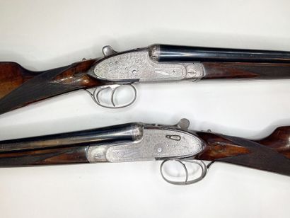 null Ø paire de fusil juxtaposé à platines Arrieta calibre 20/70 (n°30261 & 30262).

Canons...