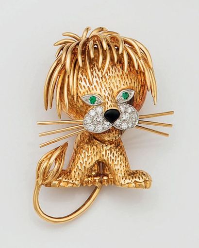 null BROCHE VAN CLEFF & ARPELS Lion en or jaune 18 carats (750 millièmes) et platine...