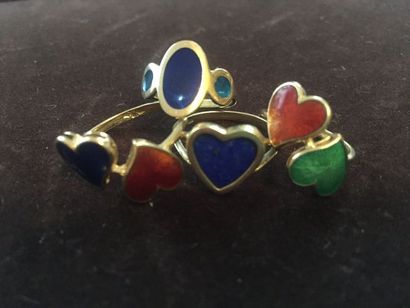 null Bague en or 18K (750), ornée

d'un coeur en lapis-lazuli, on

joint 3 bagues...