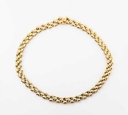 null Collier draperie deux or 750°/°° à maillons articulés grains de riz
Poids :...