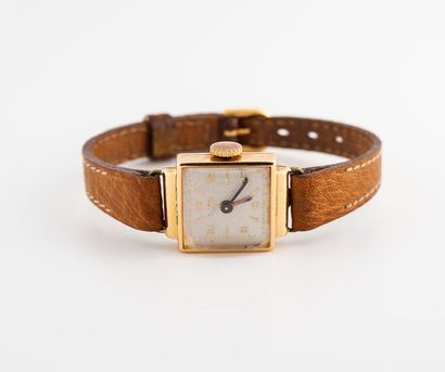 null Montre bracelet de dame en or 750°/°° modèle 1940, mouvement mécanique à remontage...