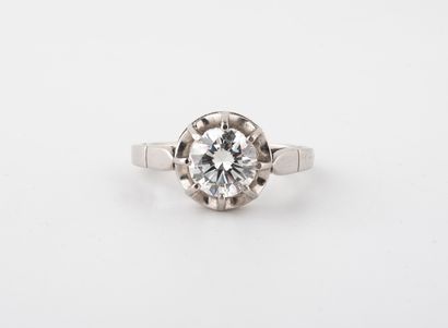 null Solitaire ring in platinum set with a round diamond of about 1.54 cts.

Gross...