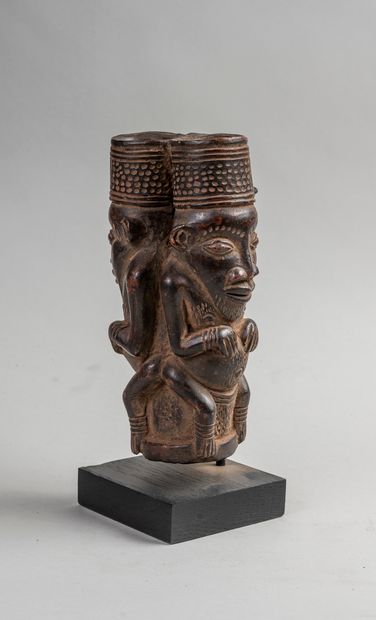 null 
BAMOUN BANULEKE, pipe with double hearth showing two men leaning against each...