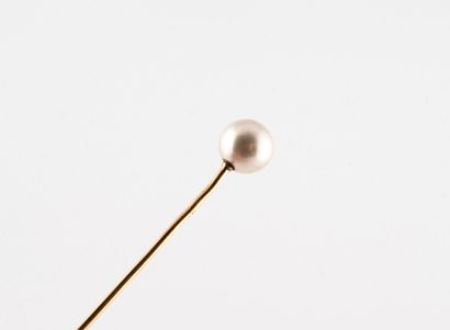null Tie pin in gold 750 °/°° decorated with a cultured pearl. 

Gross weight: 1,78...