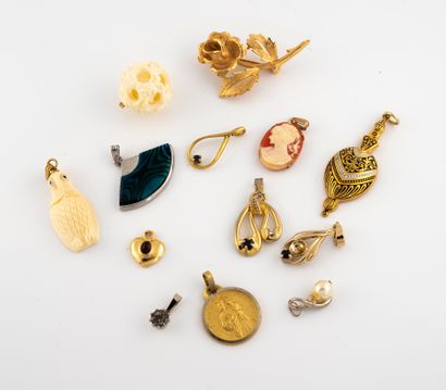 null Lot of costume jewelry including a flower brooch, a fan pendant, a drop and...