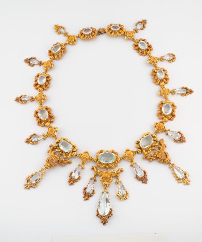 null Charles X set in gold 750°/°° comprising a pair of earrings, a necklace and...