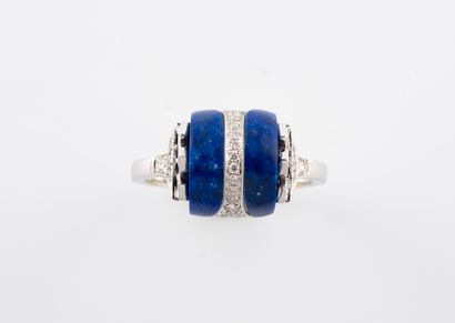 null Ring in white gold 750°/°° set with lapis lazuli enhanced by a geometric diamond...