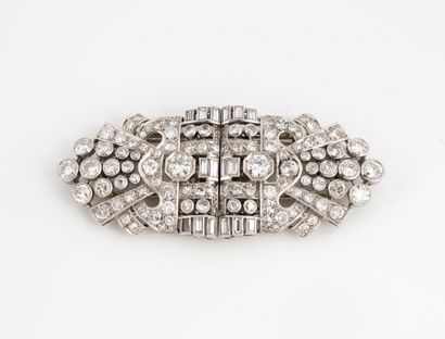 null Double Art Deco platinum clips enhanced with a geometric pavement of round and...