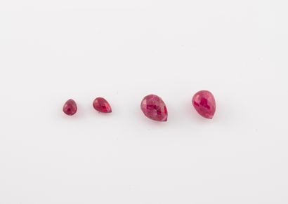 Lot of two pairs of faceted pear rubies totaling...