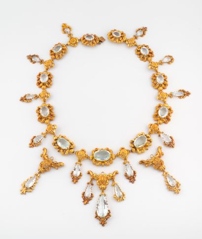 null Charles X set in gold 750°/°° comprising a pair of earrings, a necklace and...