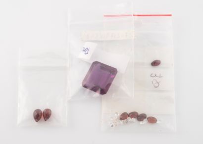 Lot of garnets, synthetic amethyst, and ...