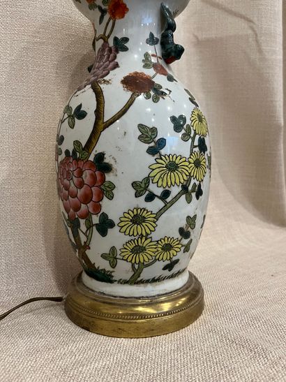 null China.
Porcelain baluster vase with polychrome enameled decoration of flowering...