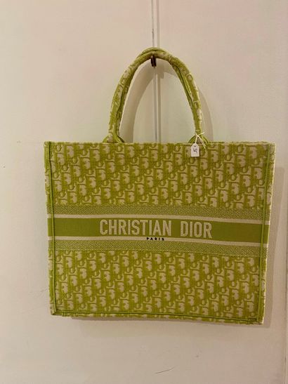 null DIOR
Book Tote bag in monogrammed green canvas.