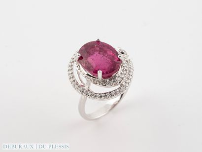 null Tourbillon ring in 750°/°° white gold set with a rubellite weighing approx....