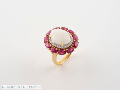 null 750°/°° gold pompadour ring set with an opal cabochon weighing approx. 3 cts...