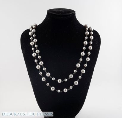 null 925°/°° silver necklace adorned with tinted freshwater cultured pearls
Gross...