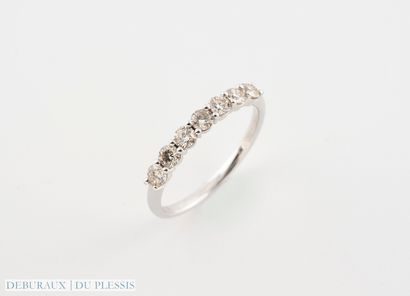 null Half wedding band in white gold 750°/°° set with diamonds weighing approx. 0.50...