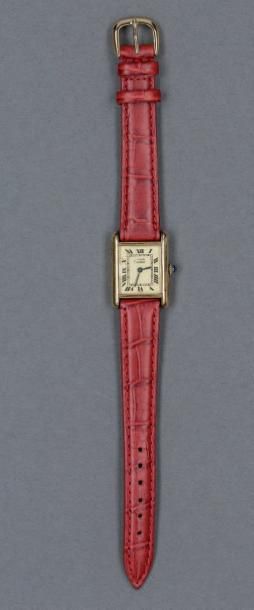 MUST de CARTIER Bracelet montre de dame Tank, boitier argent plaqué or, mvmt mécanique,...