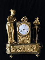null Pendule en bronze doré représentant Vénus face à l'Enfant miracle et l'Amour...